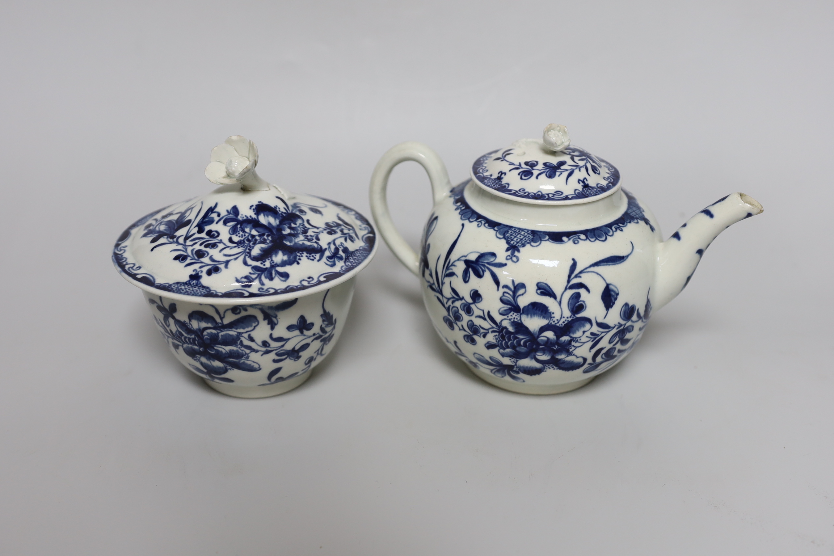 An early Worcester sucrier and cover painted with the Mansfield pattern, and a teapot and cover in the same pattern, c.1760, tallest 13cm